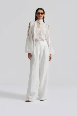 Malina Cora blus