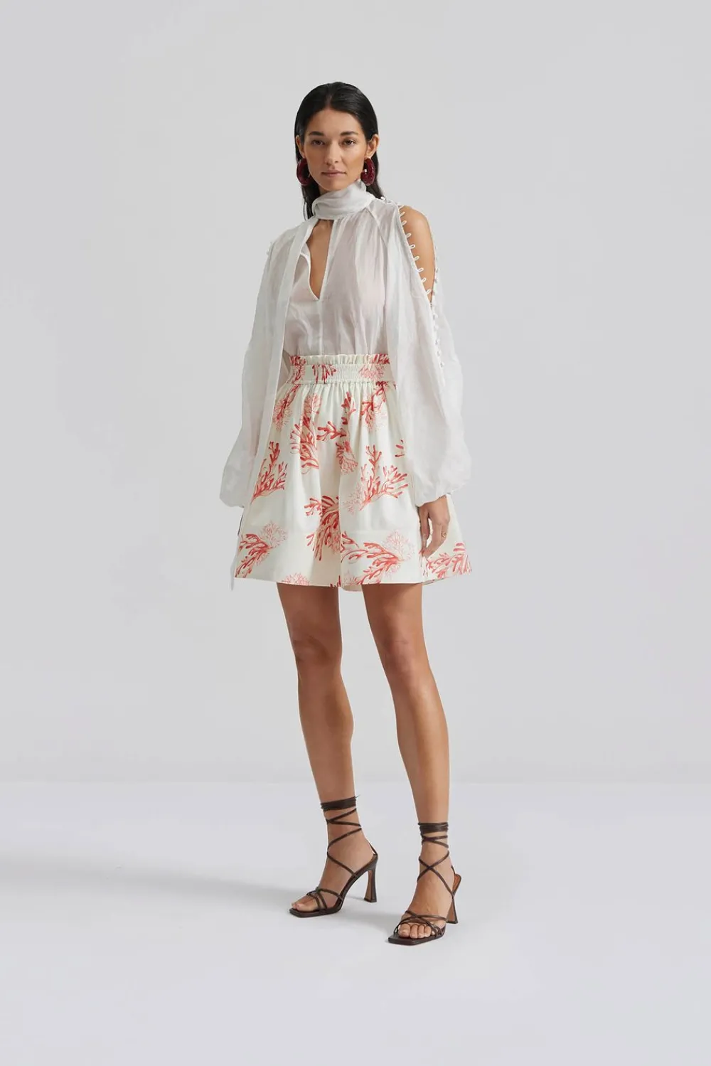 Malina Cora blus