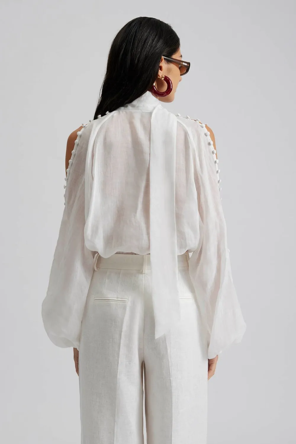 Malina Cora blus