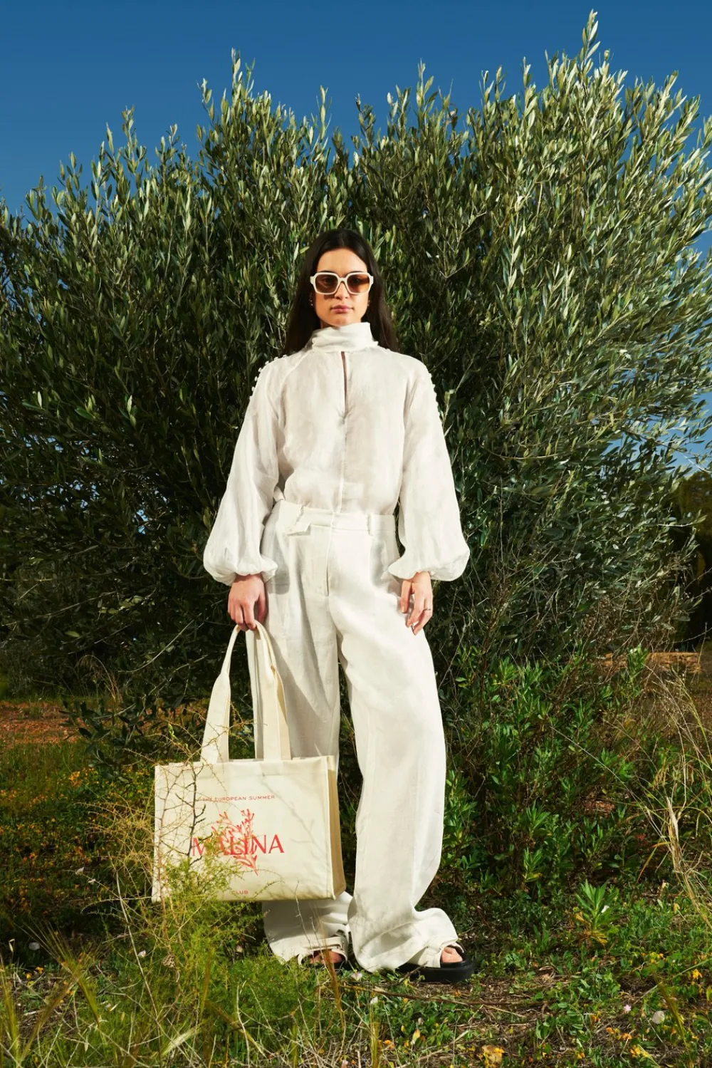 Malina Cora blus